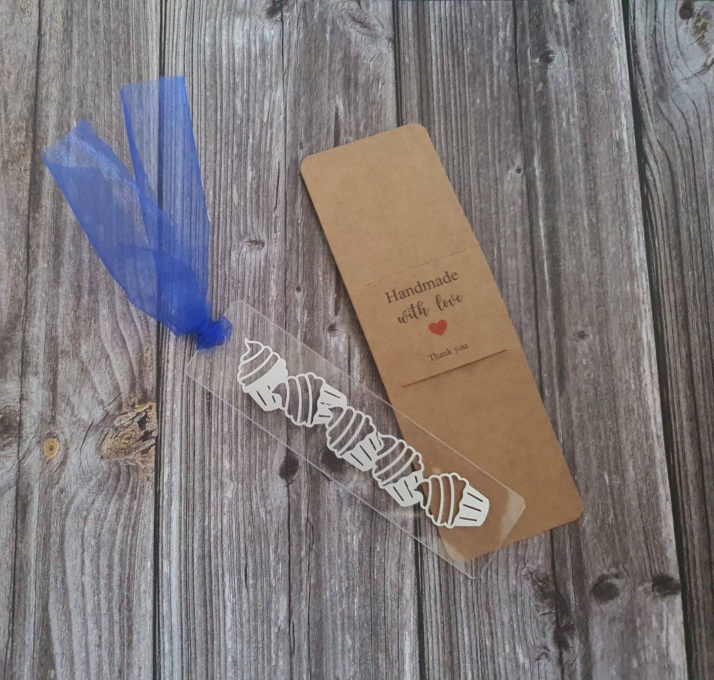 Silver cupcake acrylic bookmark with dark blue tassel