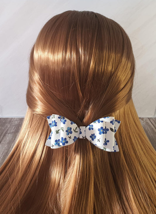 White and blue floral bow hairclip