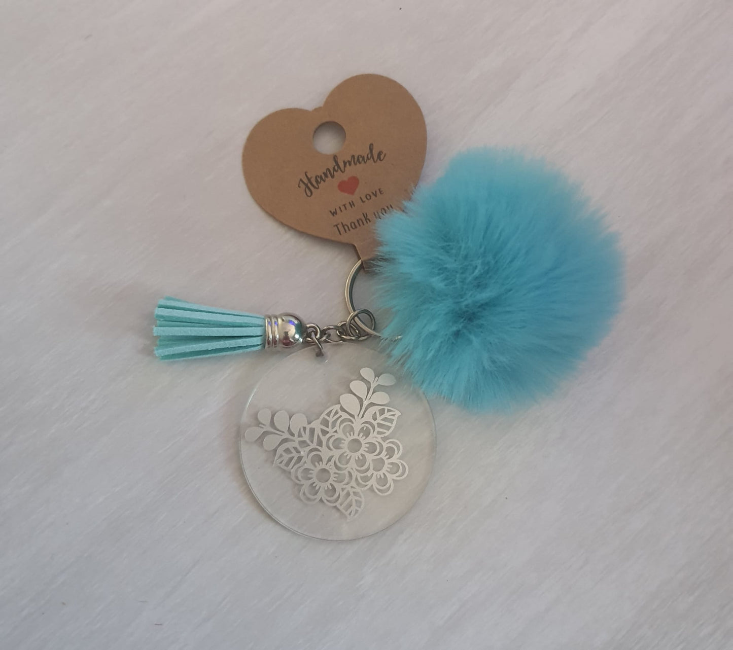Light blue floral pom pom acrylic keyring
