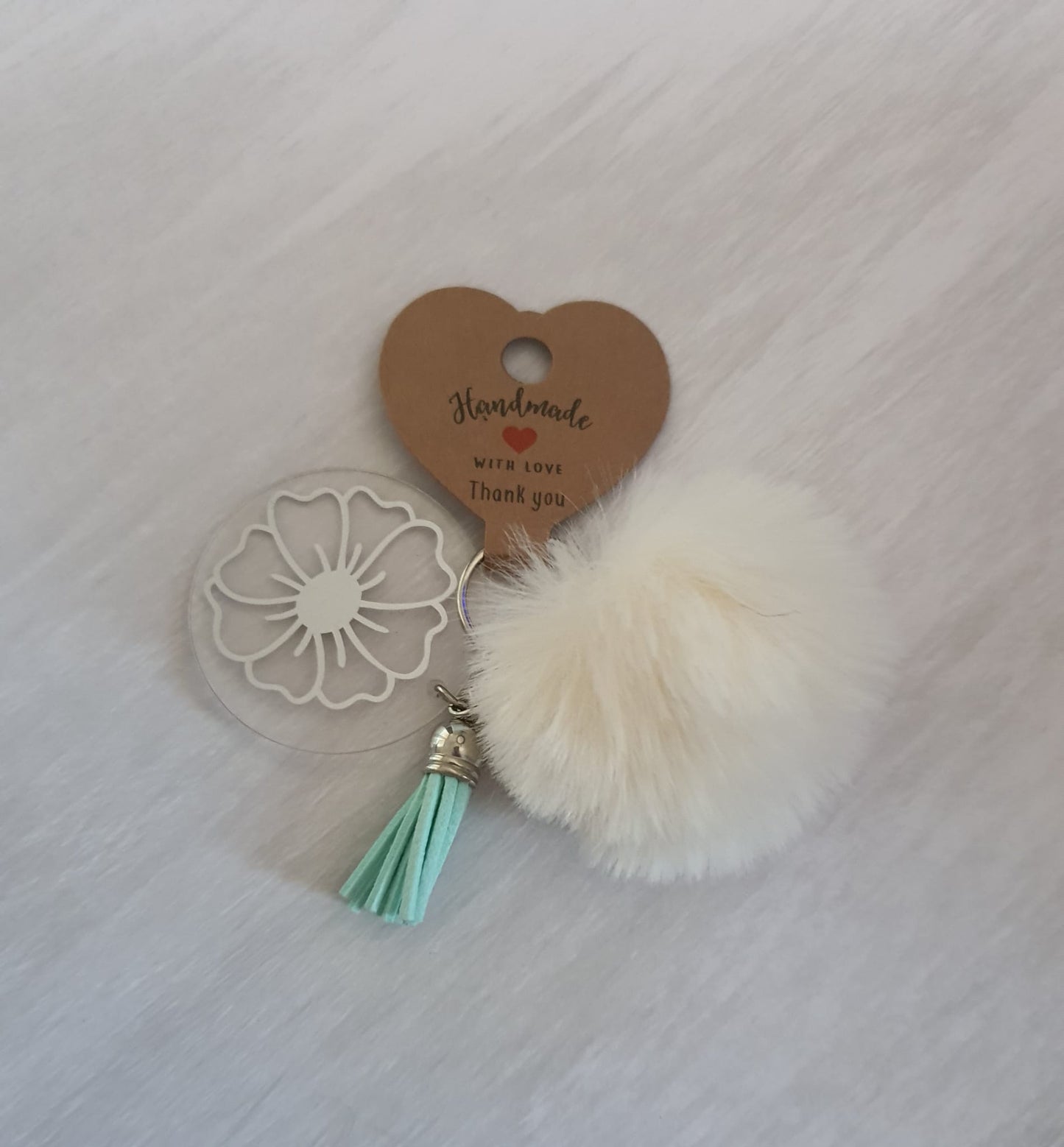 Cream floral pom pom acrylic keyring