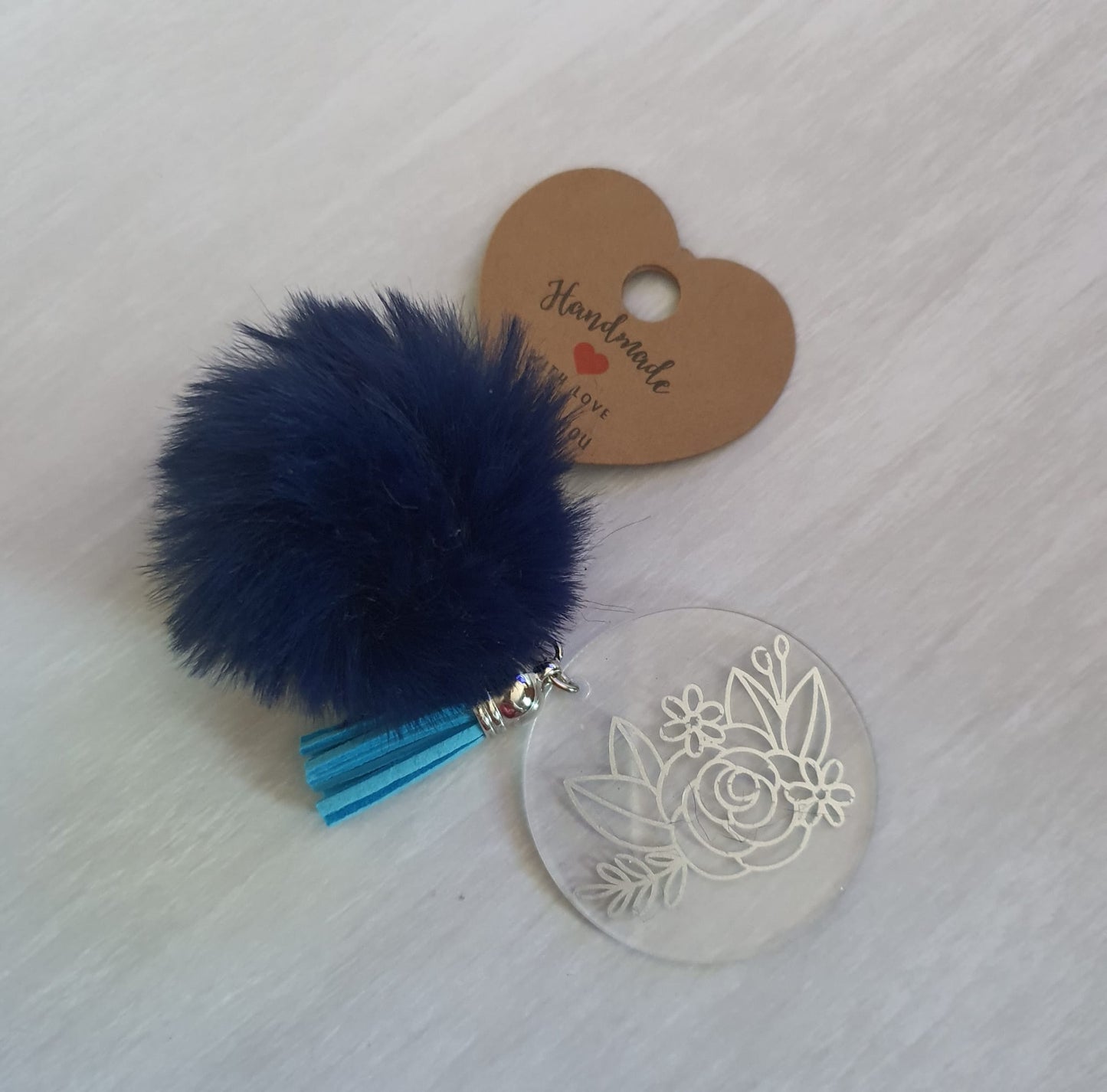 Dark blue floral pom pom acrylic keyring