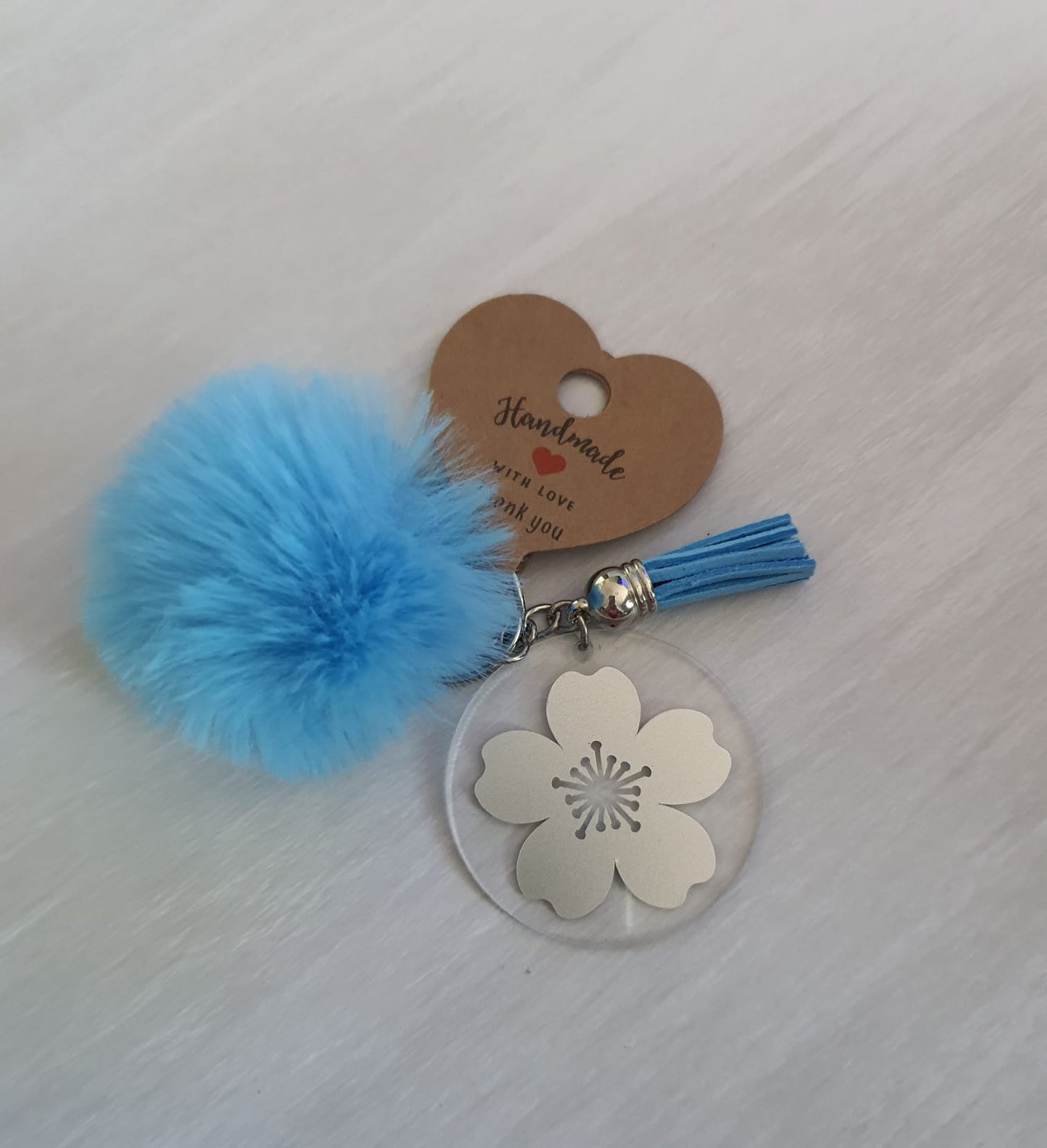 Pastel blue floral pom pom acrylic keyring